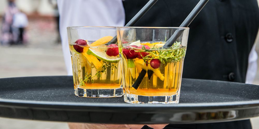 waiter and tray of drinks